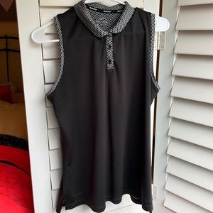 Nike dry fit sleeveless golf shirt with Peter pan collar. Size L